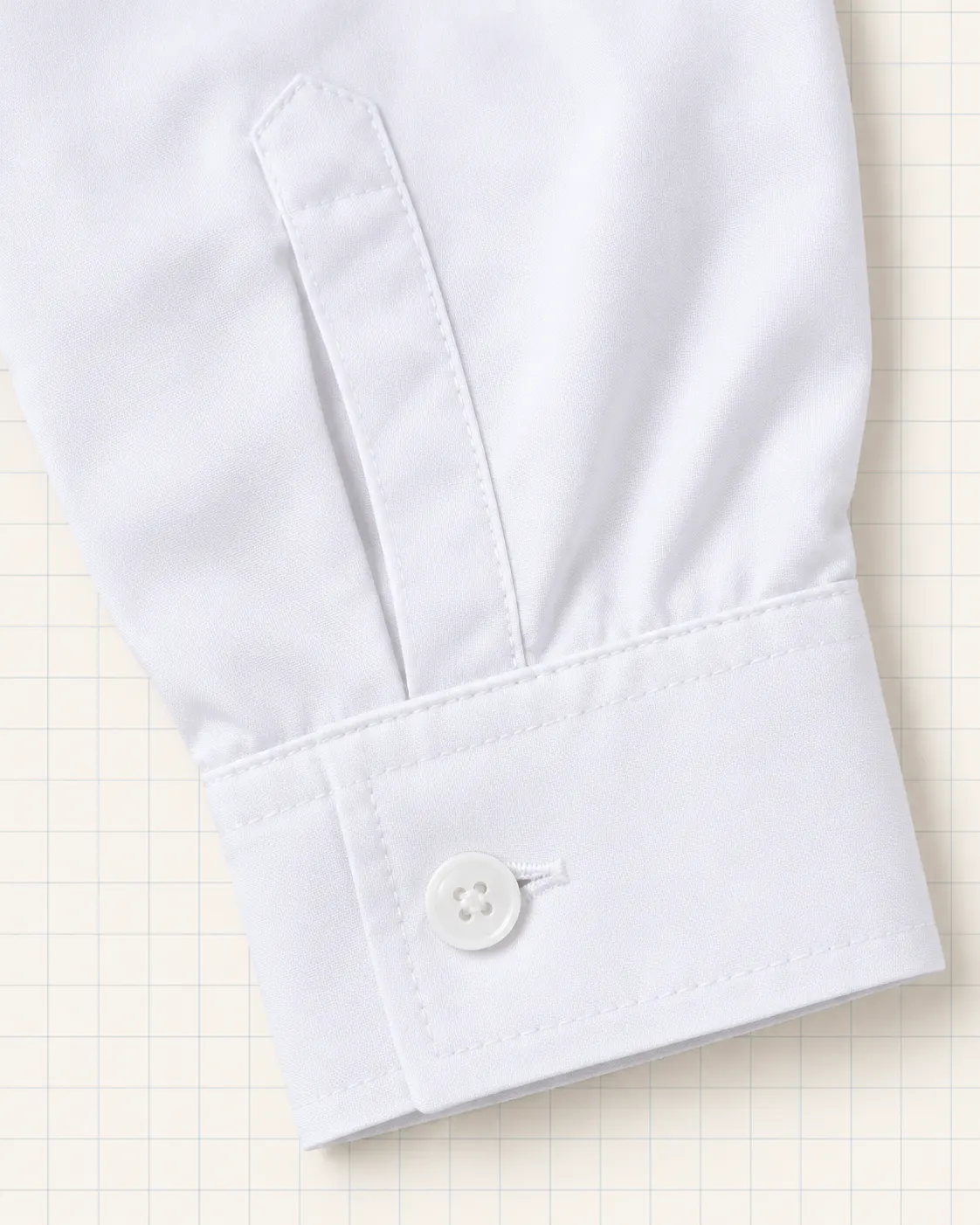 Camisa escolar manga larga blanco, detalle de puño